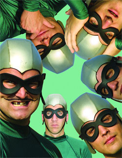 A picture of the members of the Aquabats wearing green costumes and masks with their heads rotated in a circle around the picture.
