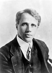Robert Frost, head-and-shoulders portrait, facing front. He is about forty years old and is wearing a suit.